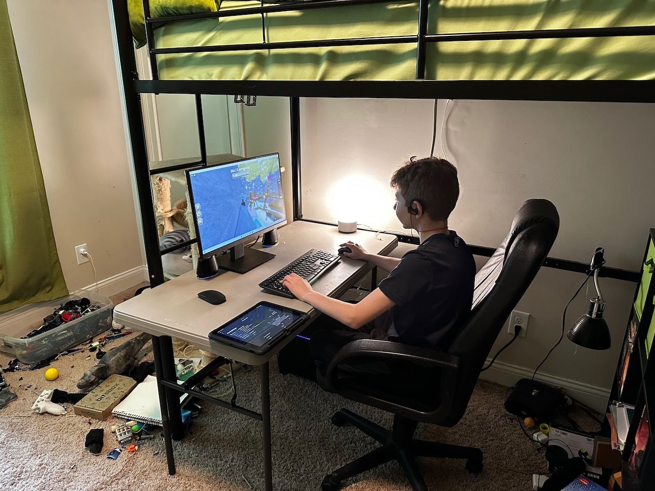 My son playing his first game on the new PC in his room
